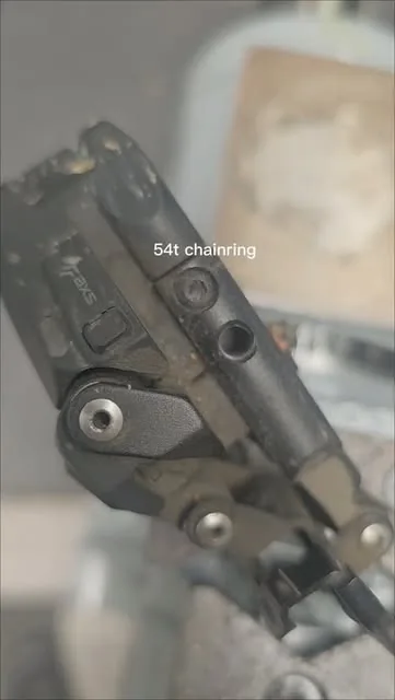 Close-up of a SRAM Force front derailleur during a 54-tooth chainring upgrade